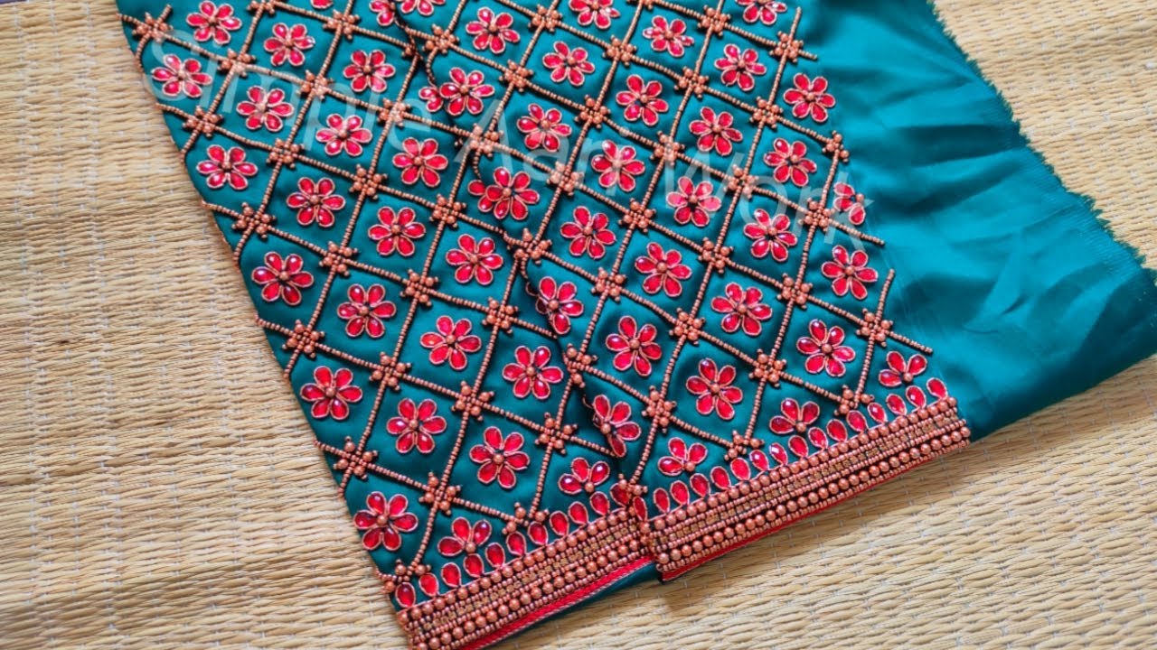 Bridal blouse in simple aari work.