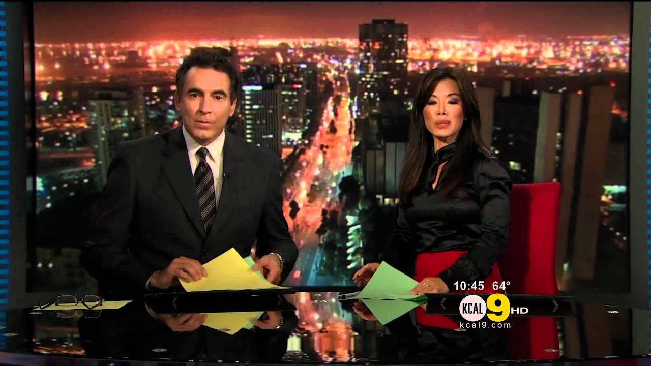 Sharon Tay 2011/09/01 10PM KCAL9 HD; Satin black top, pokies