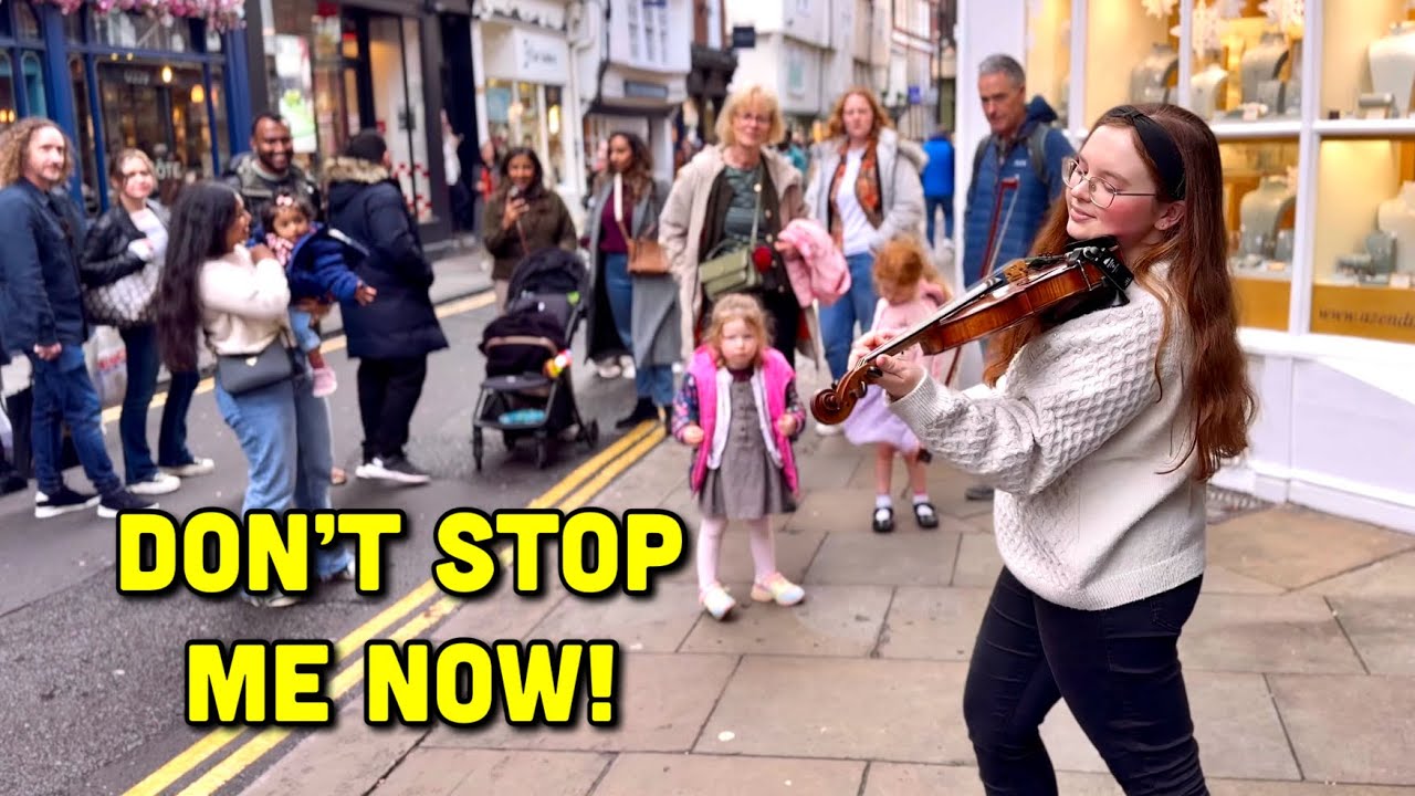 Crowd Stops For Busking Violinist Playing 'Don't Stop Me Now' by Queen!