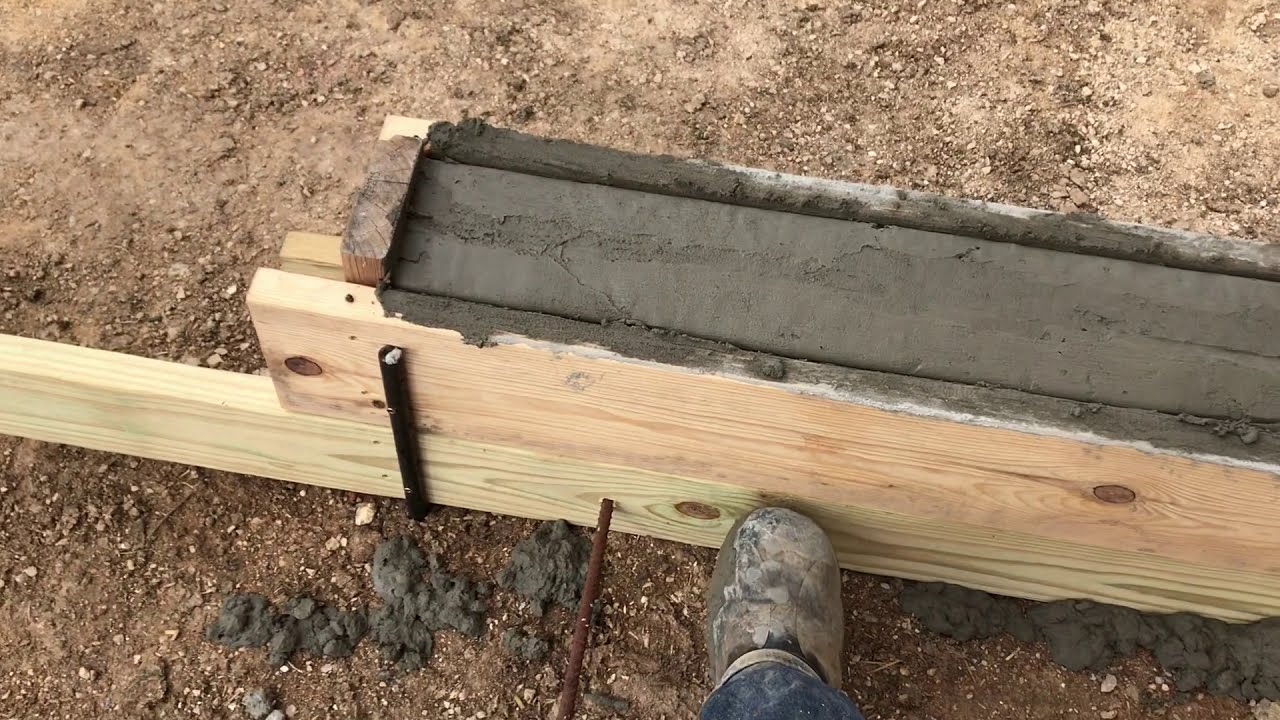 Pouring Curbs for a New Free Stall Barn. Where cows go.