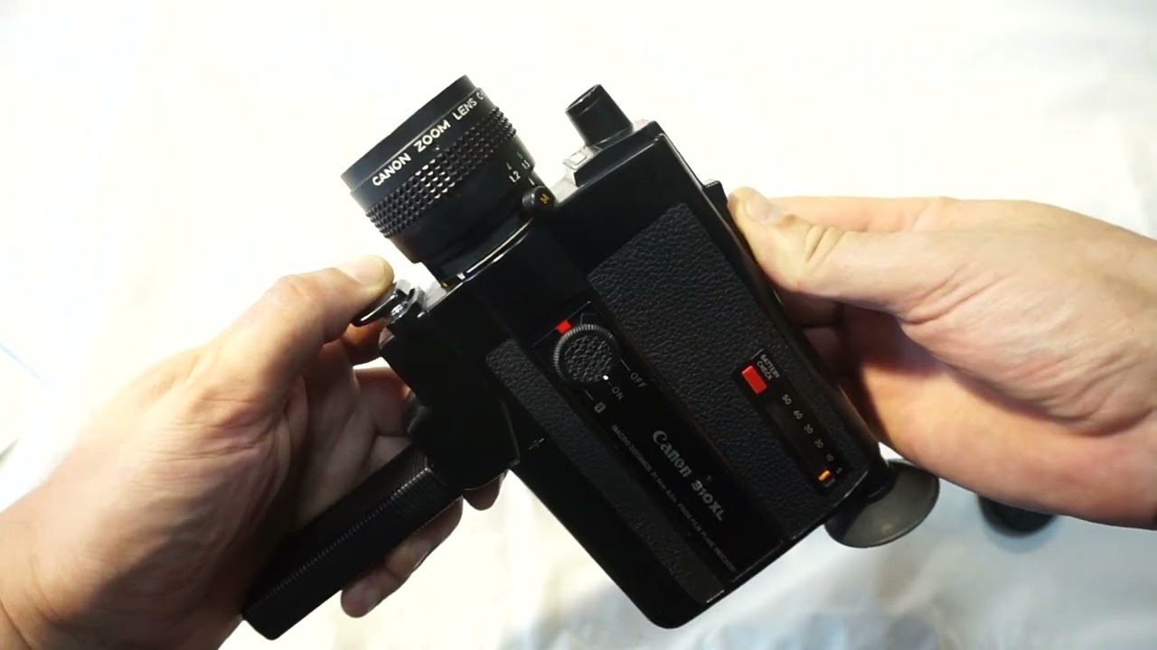 Canon 310XL loading Super 8 film and batteries on Canon 310XL + Canon C-8 Wide Attachment 43
