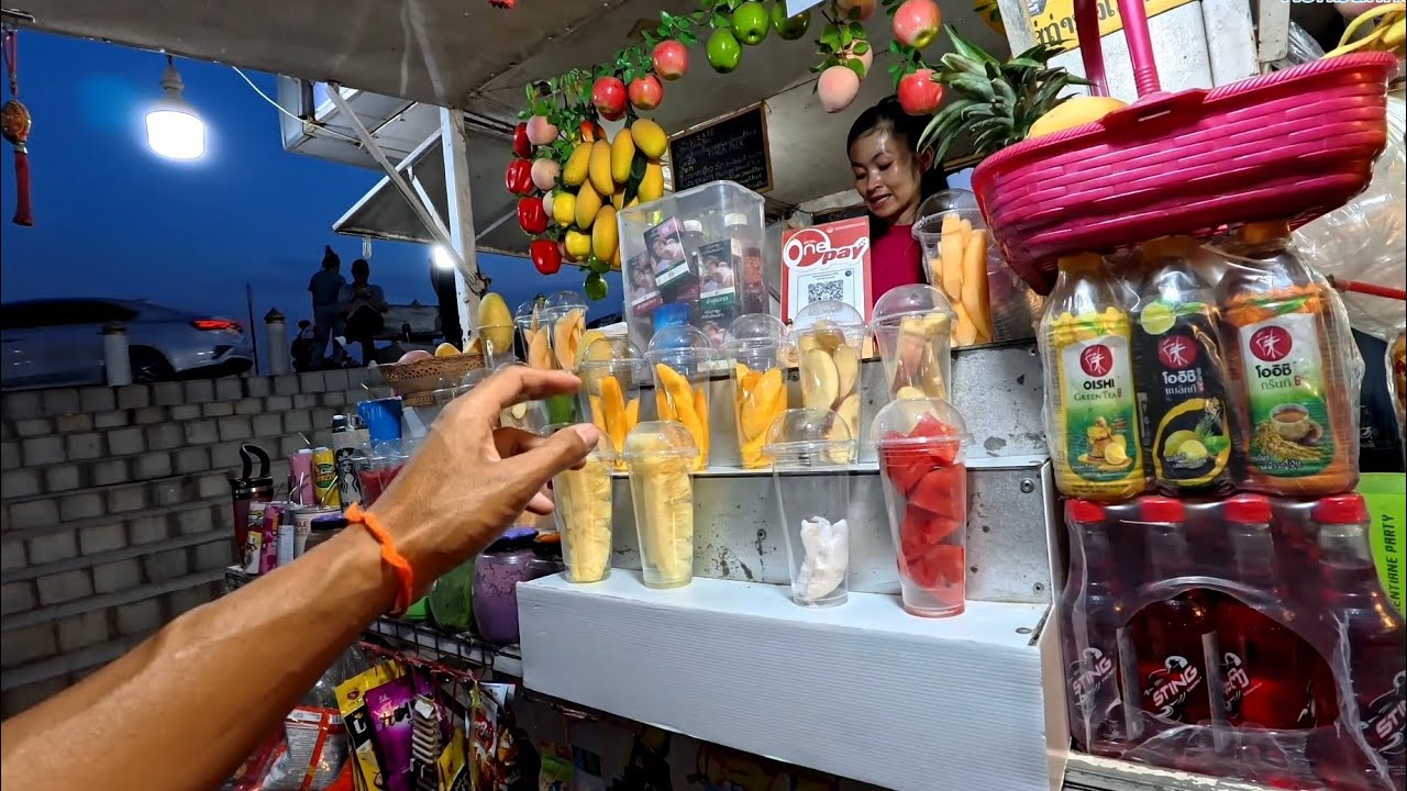 Beautiful night by the Mekong riverside. Walking the night market in Laos.