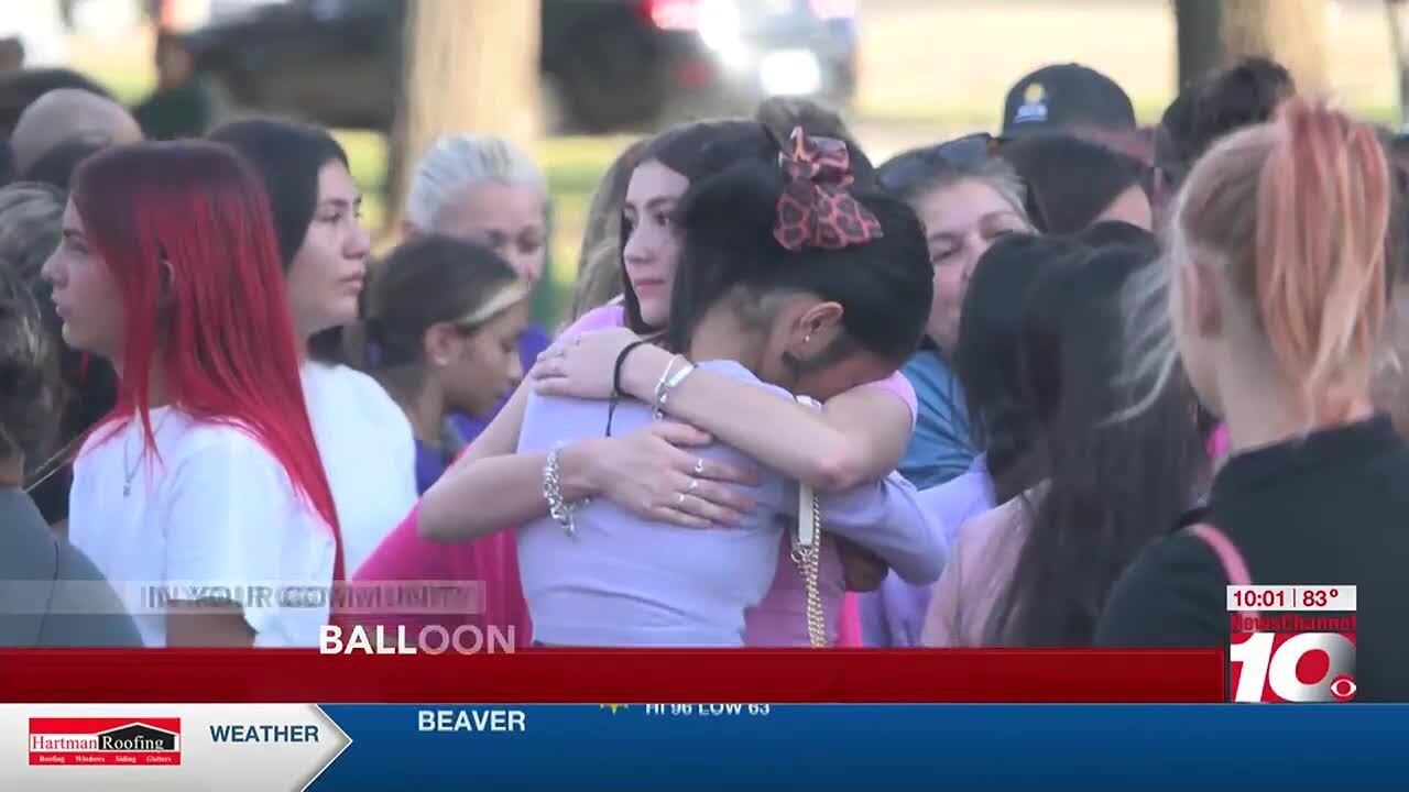 VIDEO:  Community honors victims of murder-suicide with balloon release at Alamo Park