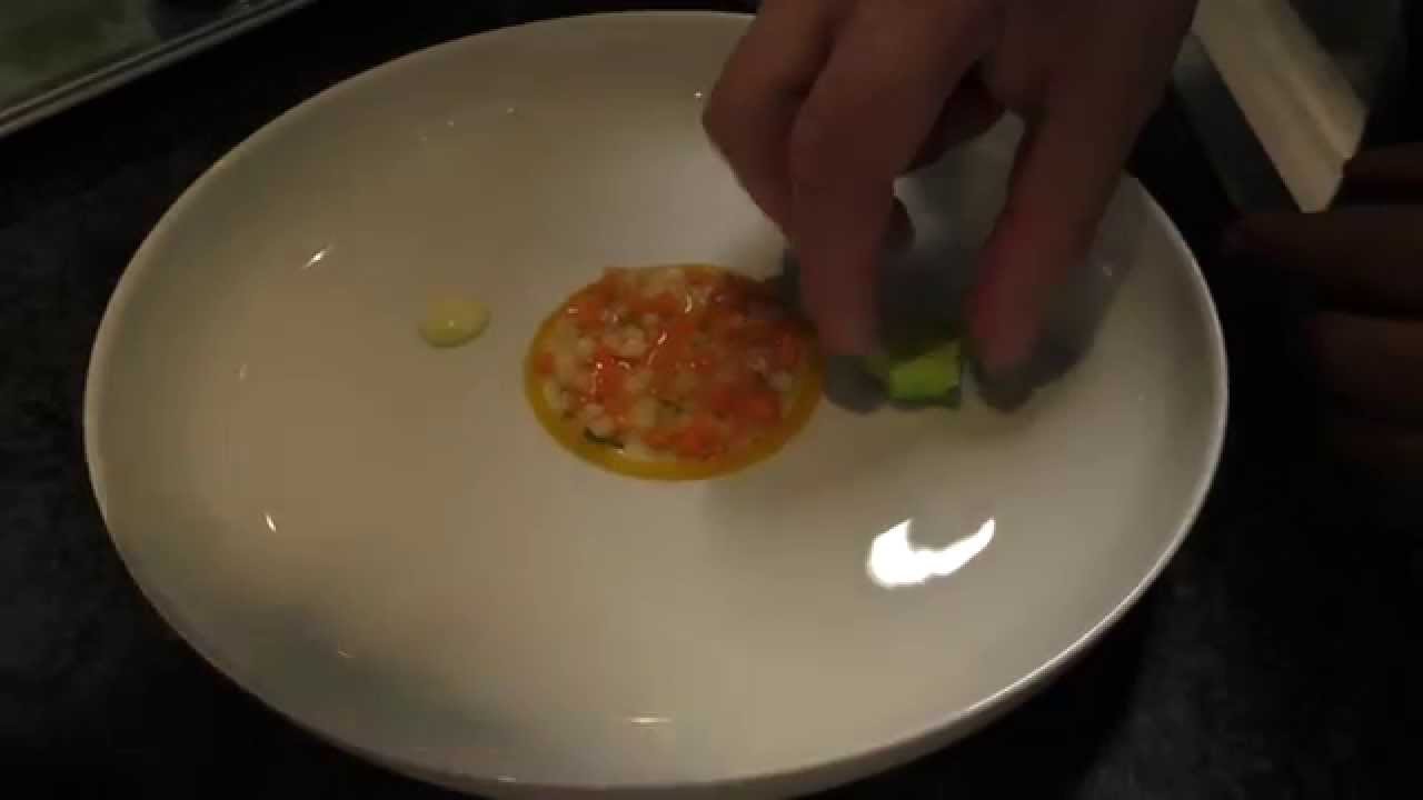 Tim Raue prepares the starter Langoustine at the Michelin star restaurant Tim Raue