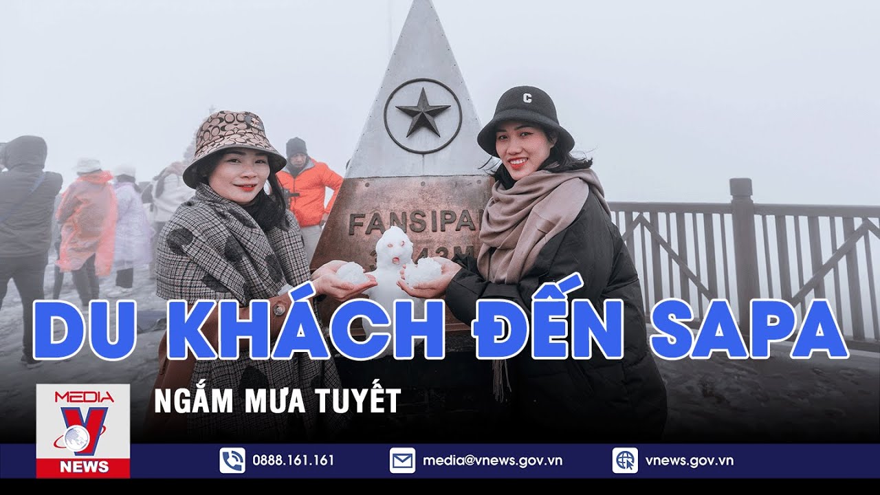 Du khách đến Sapa ngắm mưa tuyết - VNEWS