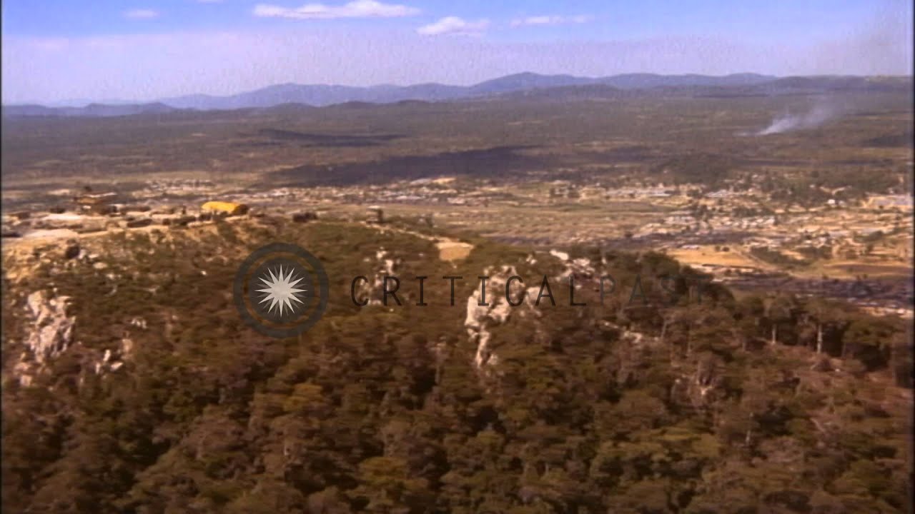 Camp,observation post atop mountain and green belt around 1st Cavalry Division ca...HD Stock Footage
