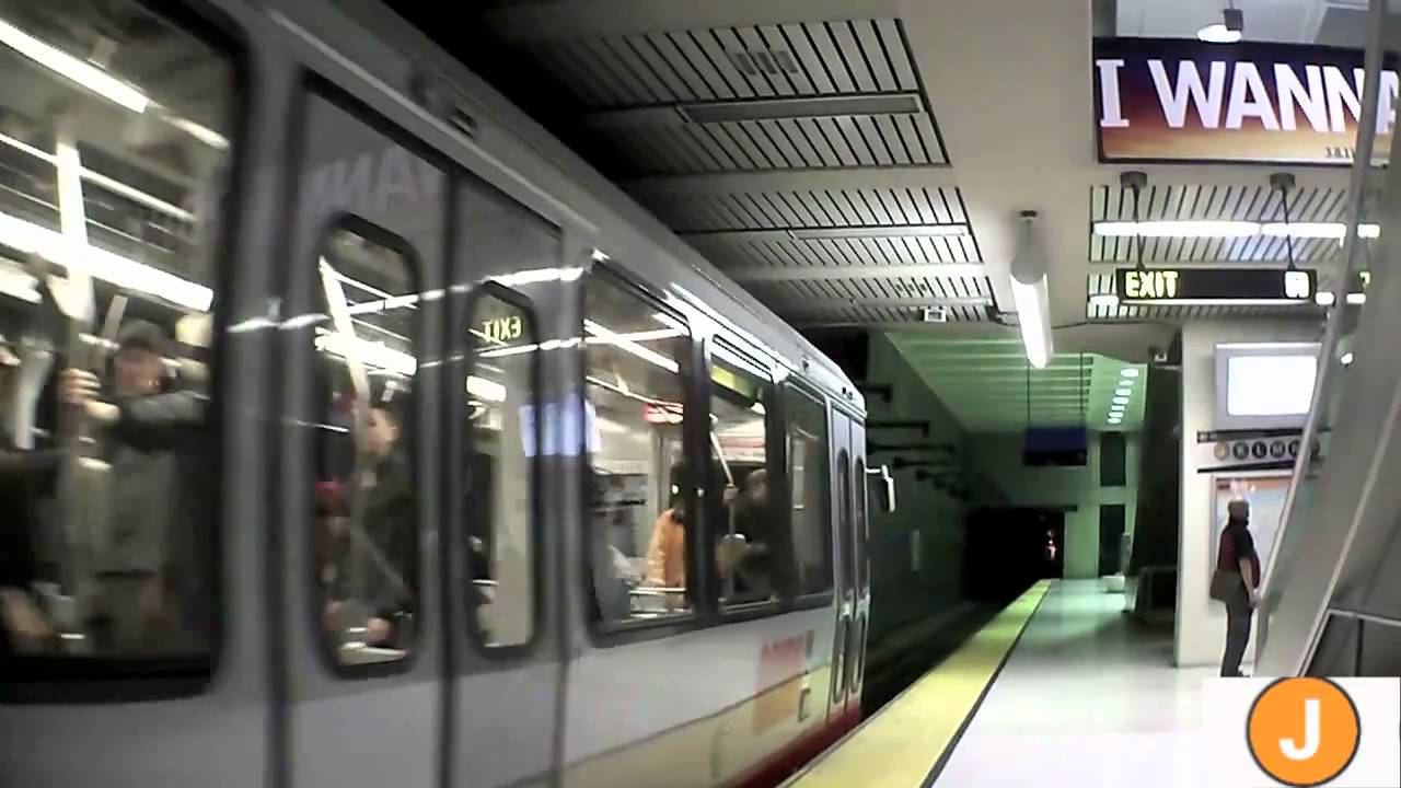 Muni Metro trains in the Van Ness station