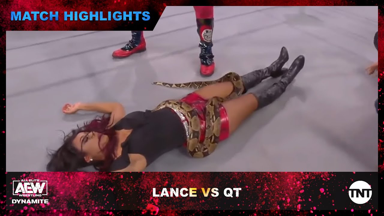 Jake the Snake Roberts taunts Brandi Rhodes with a snake In the AEW Ring