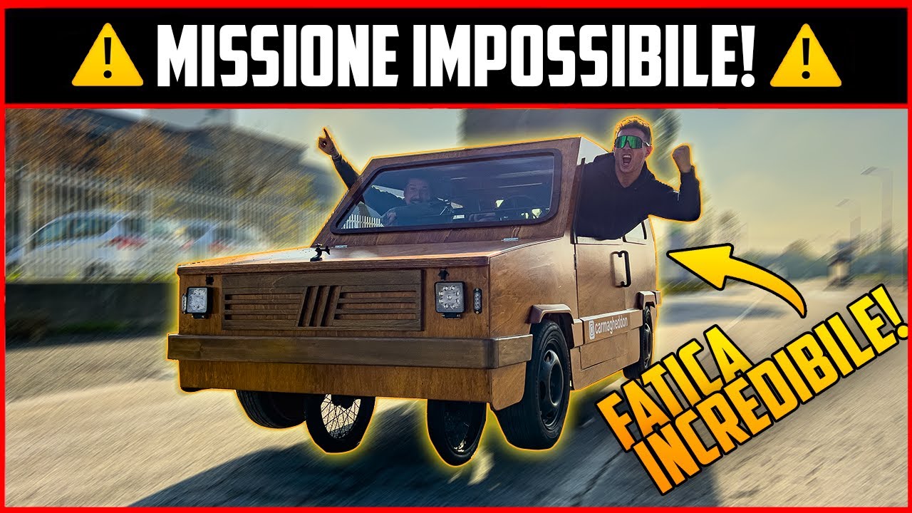 100 KM CON UN'AUTO IN LEGNO.