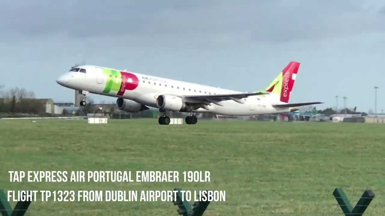 TAP Express Air Portugal Embraer 190LR take off from Dublin Airport IRELAND