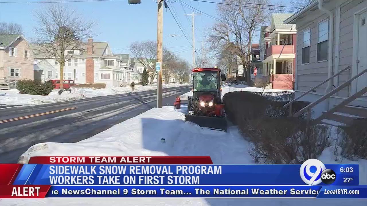 Syracuse sidewalk snow removal program in action