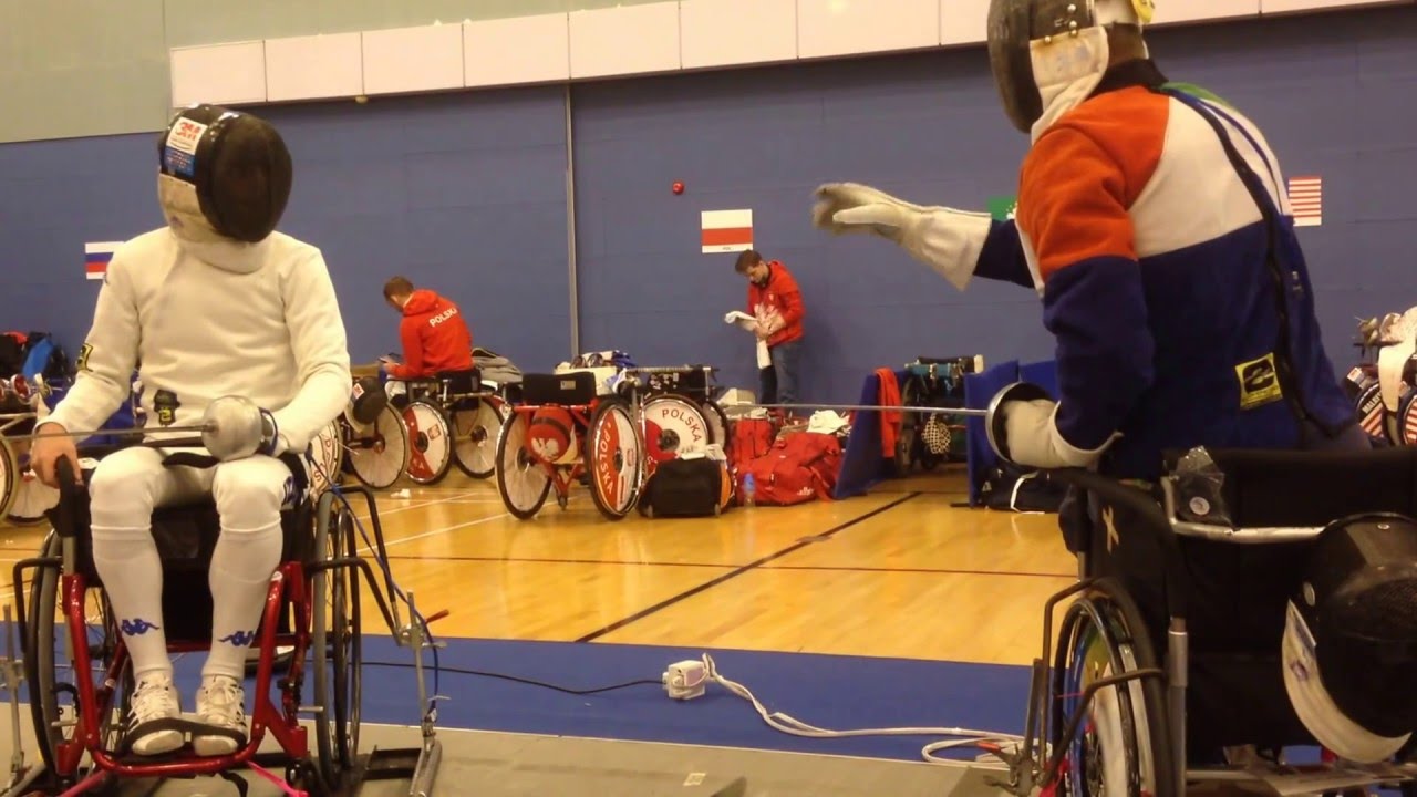 Italian wheelchair fencing team warming up epee
