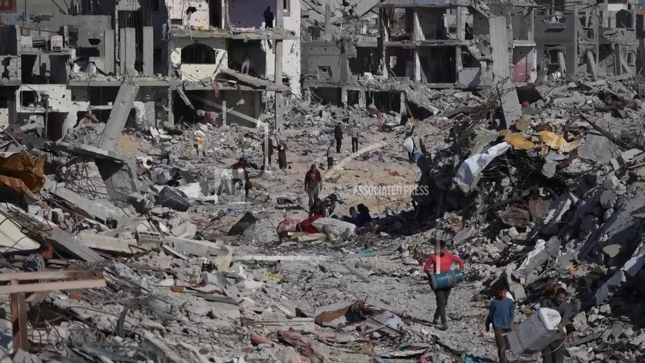 Palestinians hesitate to leave shelters to return to the rubble of what was once their home