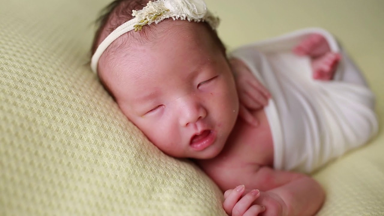 newborn photography potato sack and bean bag pose