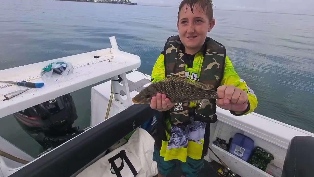 Pouring rain on the boat in Moreton Bay then it glassed out