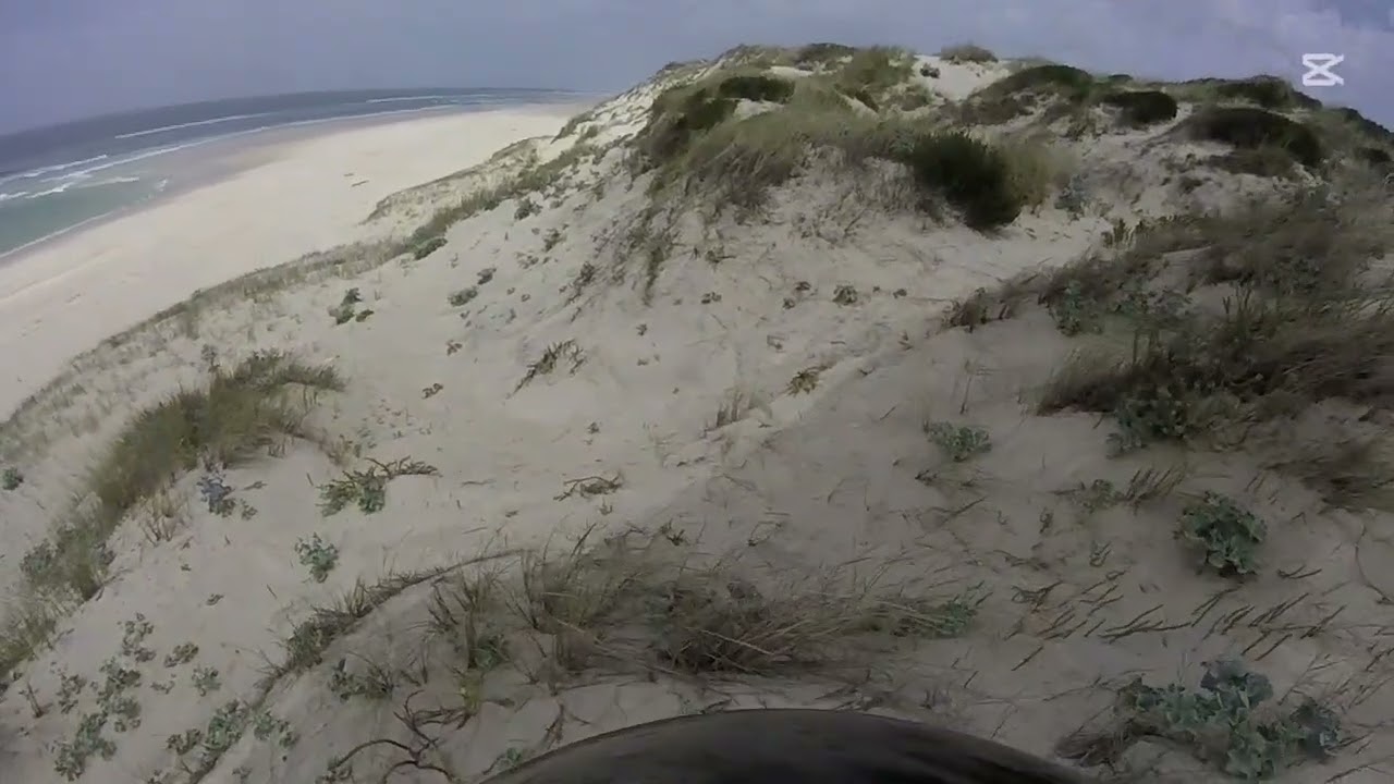 in the spirit of the dunes , with a vintage paraglider