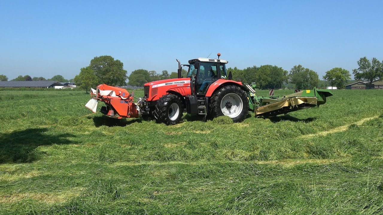 Gras maaien met Massey Ferguson 6490 Dyna-6 en Kuhn/Krone triple maaier (2021)