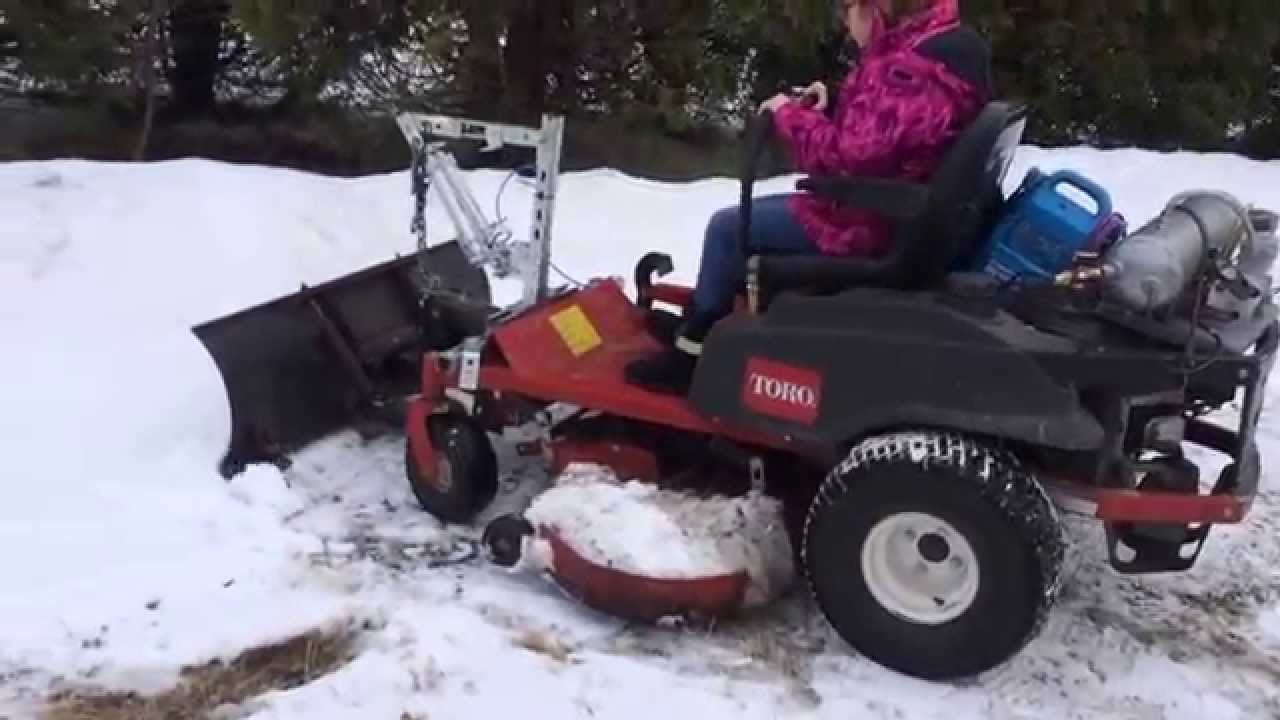 Plowing with zero turn snow plow