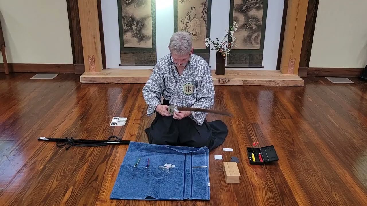 Sharpening a katana with the Lansky sharpening system for your dojo tatami cutter.