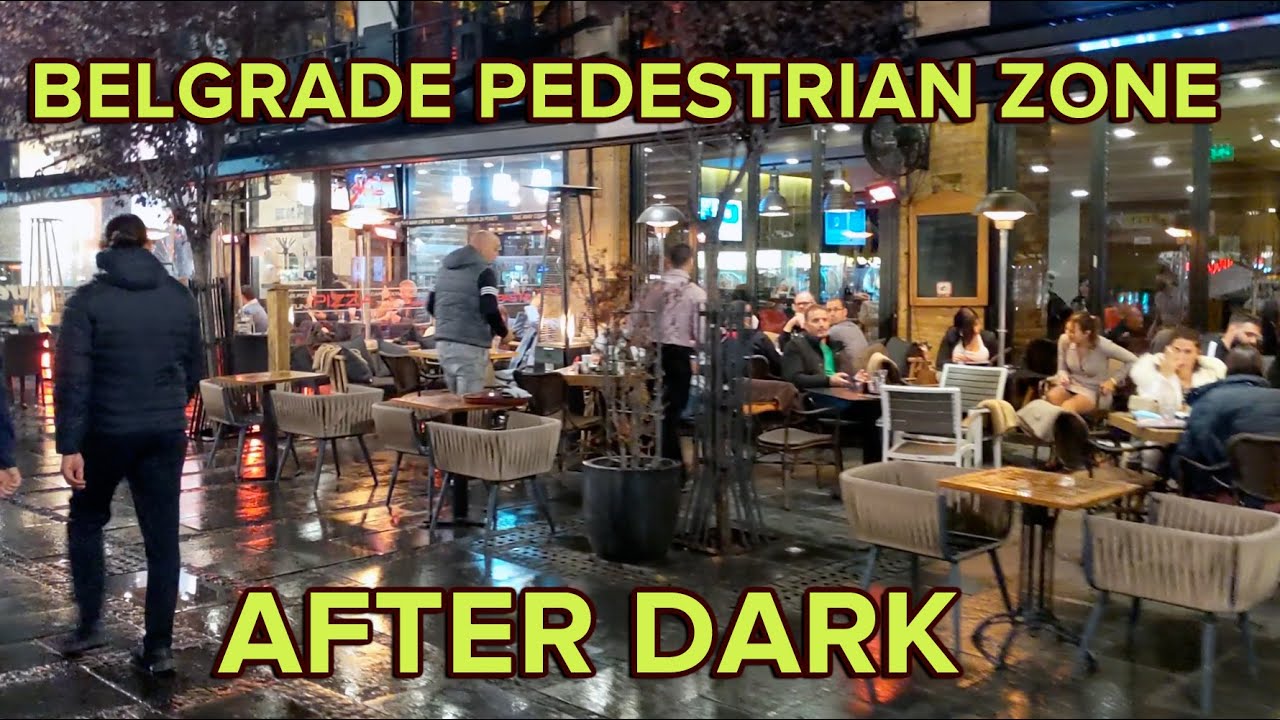 BEAUTIFUL KNEZ MIHAILOVA STREET, BELGRADE PEDESTRIAN AND SHOPPING ZONE AT NIGHT AFTER RAIN