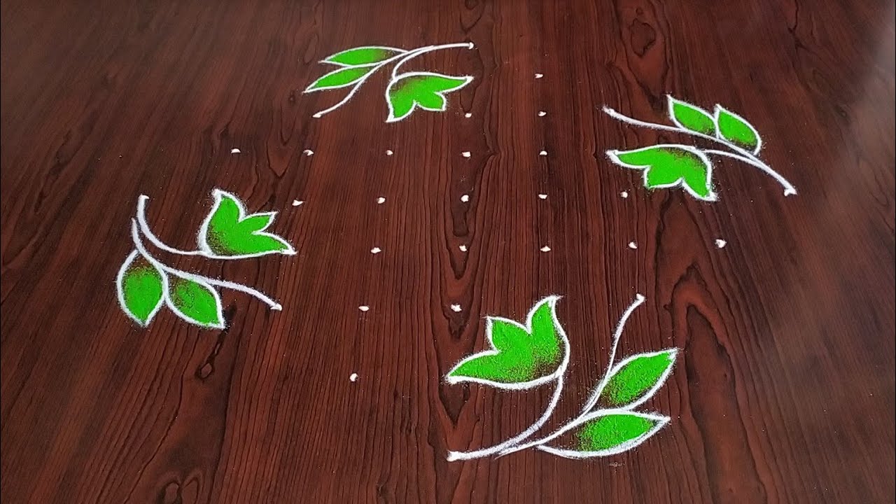 Beautiful hybiscus flowers rangoli (9×1) dots....