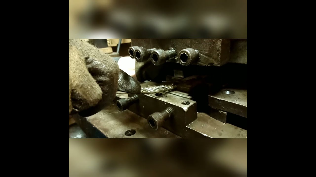 Cutting shields out on my old Sheffield press #sheffield #stevencockerknives