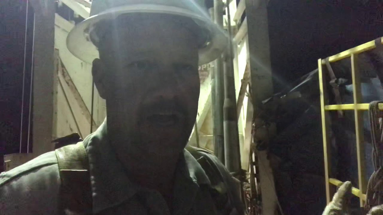 Tripping in the hole Latching up 6 1/2 inch drill collars. New Mexico Triple