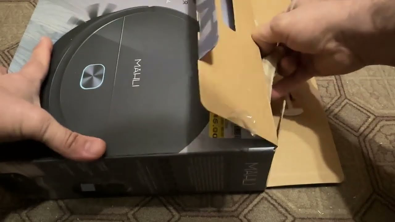 02X17 UNBOXING THE SMALL $45 BUDGET ROBOT VACUUM FROM GIANT TIGER