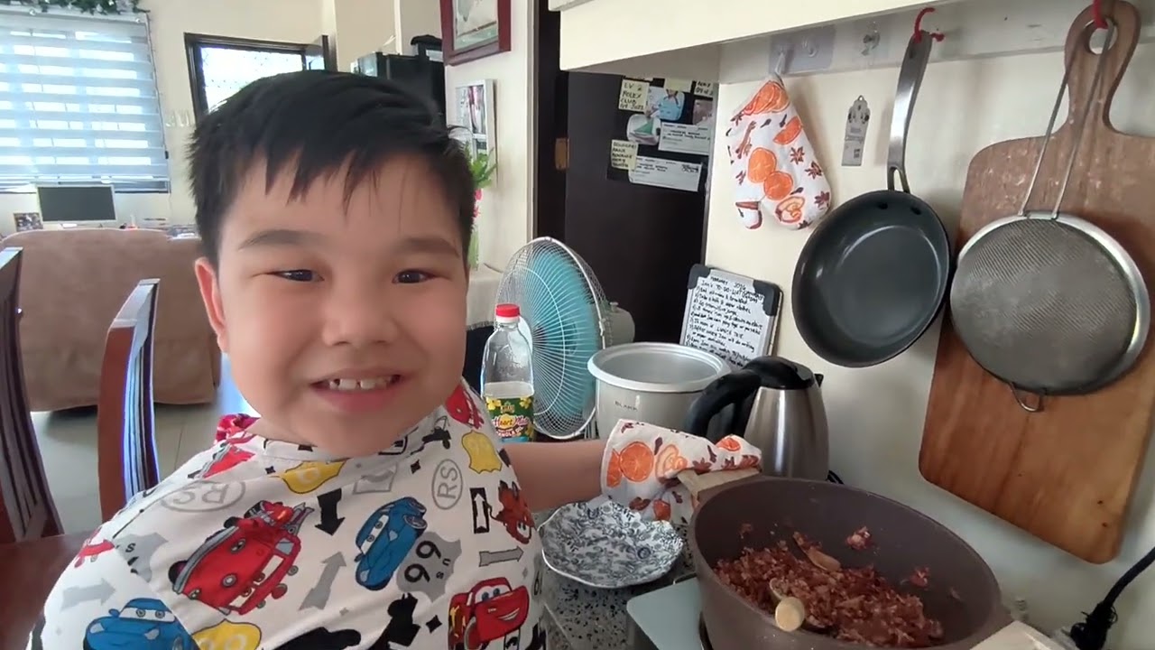 Ian is mixing spaghetti sauce #cooking #fyp #sunday #kids 