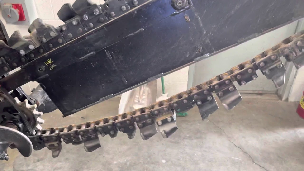 Chain adjustment on a Ditchwitch RT45
