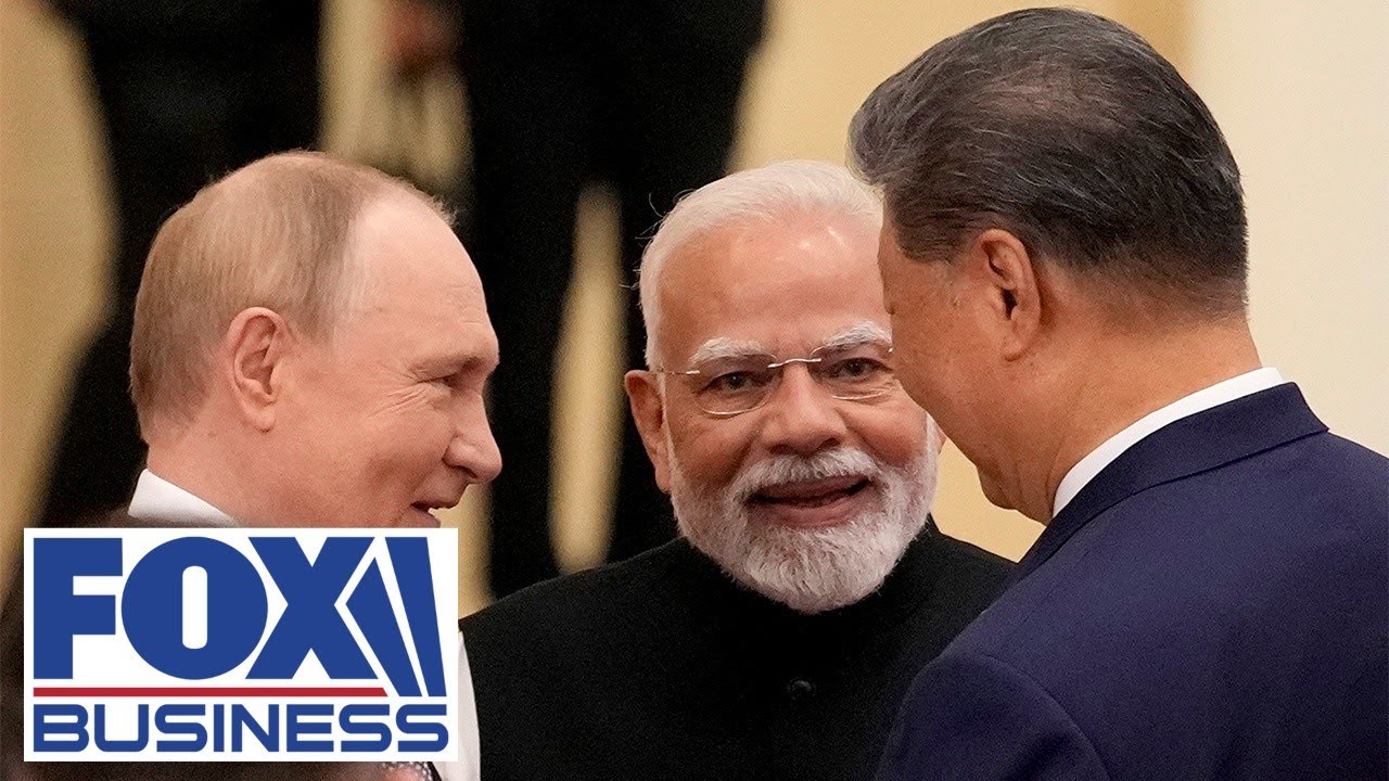 Putin, Modi and Xi cozy up at China summit
