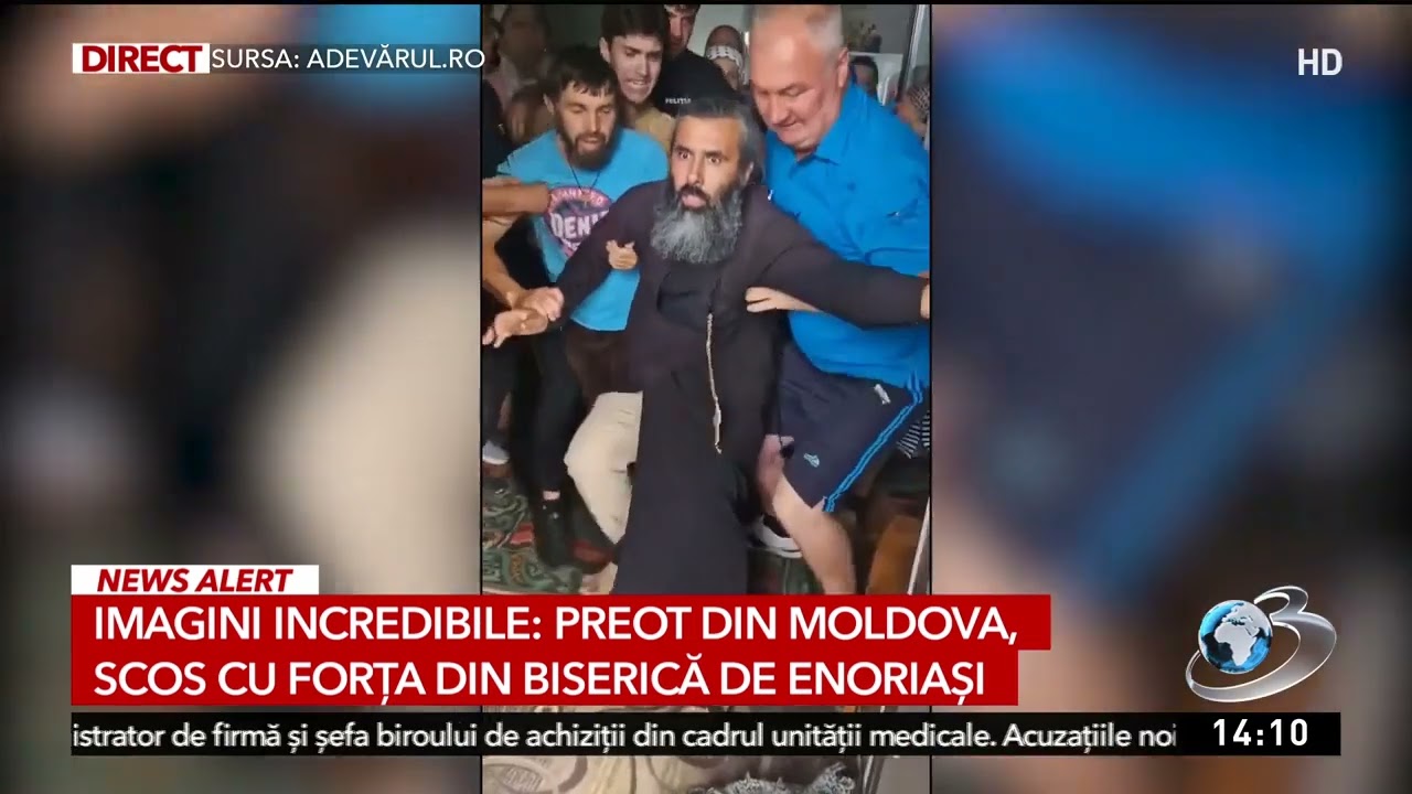 Imagini incredibile: preot din Moldova, scos cu forța din biserică de enoriași