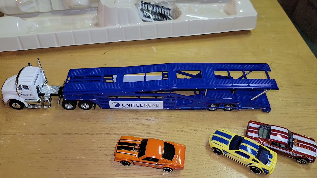 Bad packing from ebay seller SpecCast  1:64 United Road International 8600 Semi Cab w/ Car Carrier