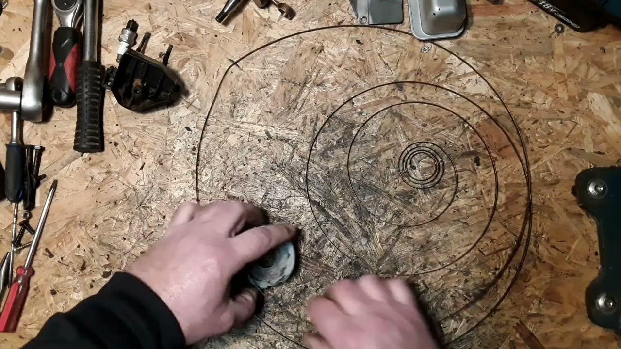 Rückholfeder vom Starter wieder aufrollen...einfach machen