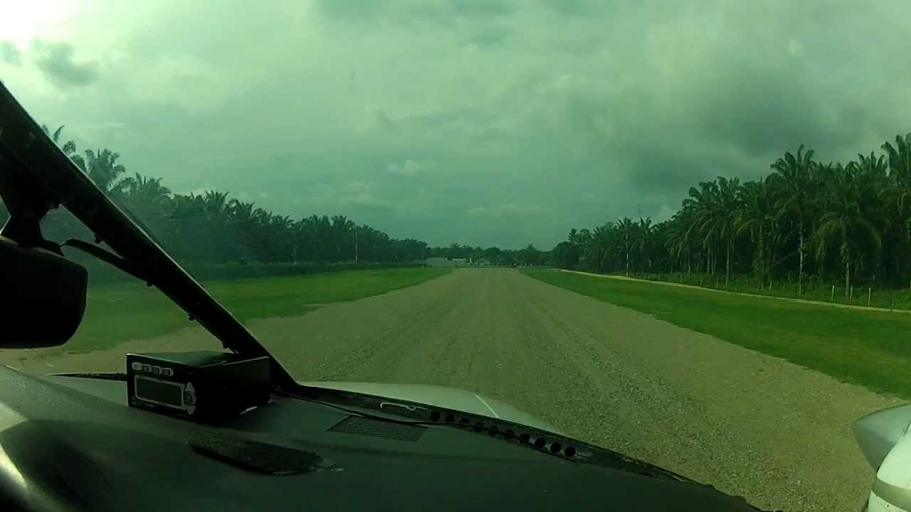 C- T303 Crusader landing on short dirt strip