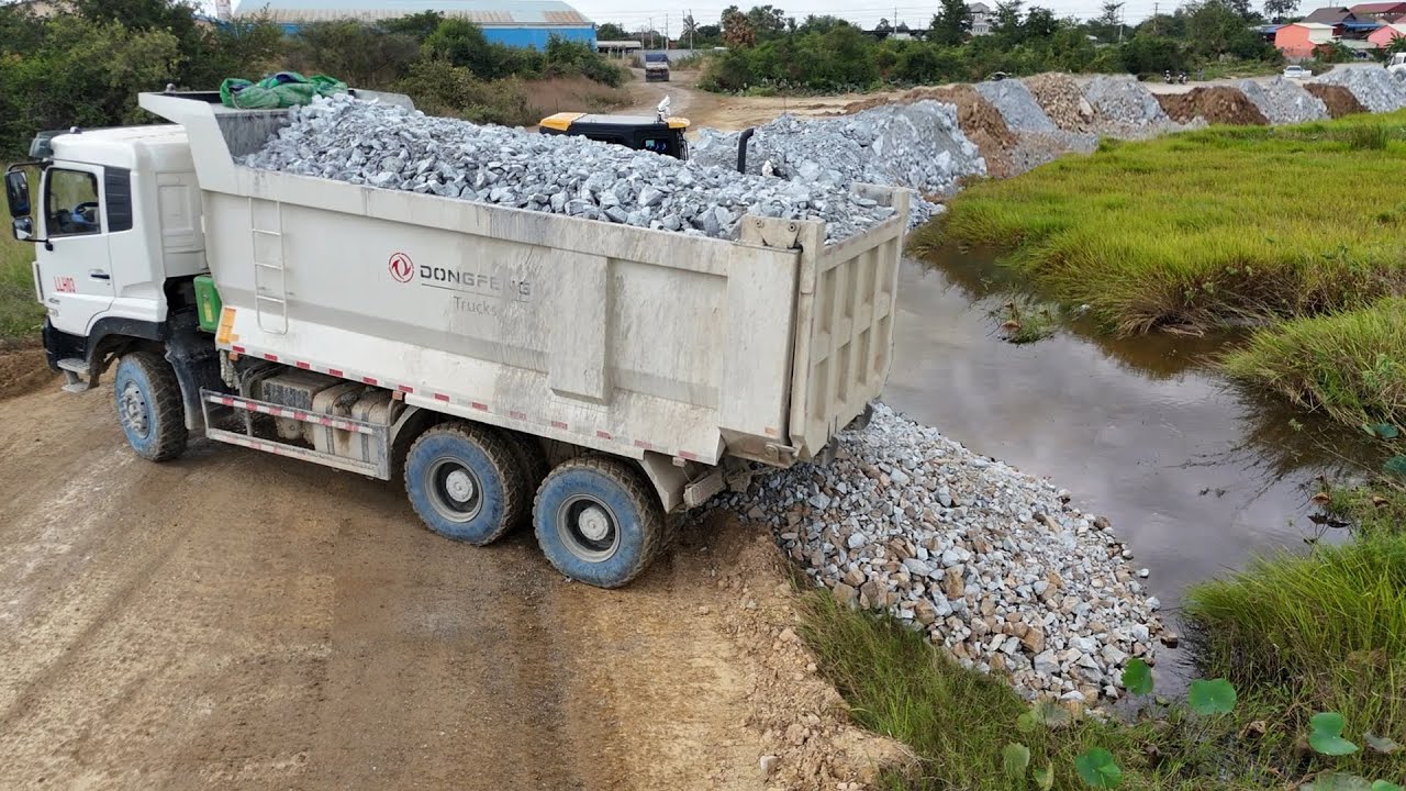 Amazing JOB !! Powerful truck 10 wheel Drop stone filling huge Area & push by big Pro dozer