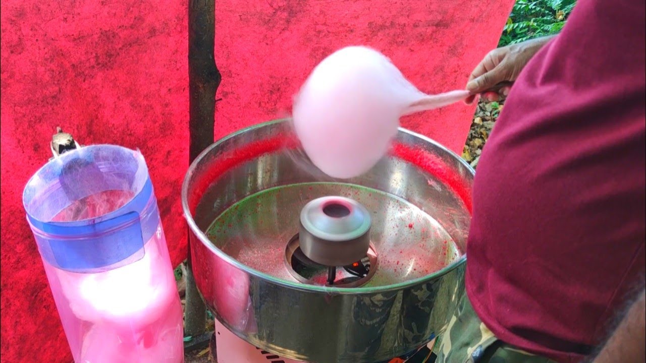 How does a street vendor make a cotton candy | how to make street food 