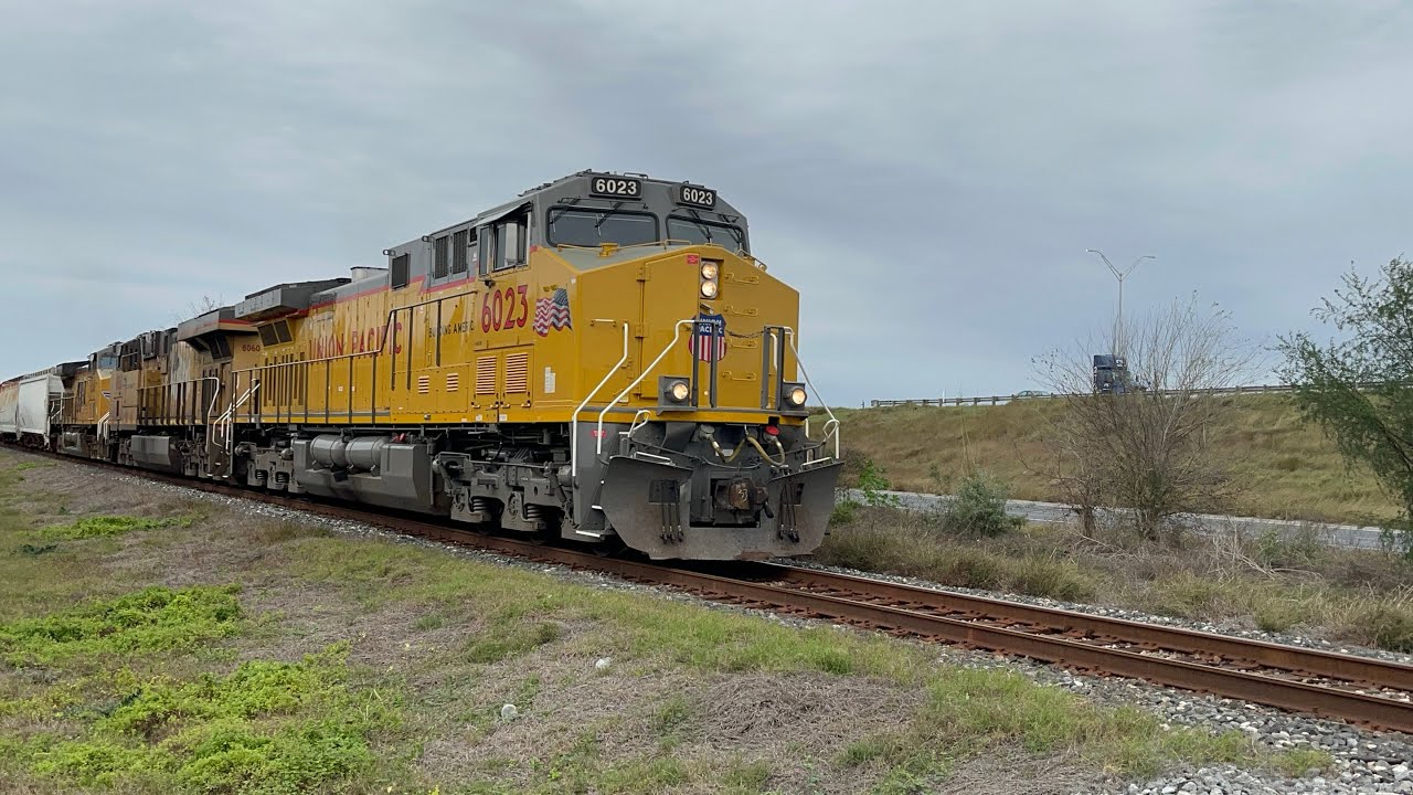 UP 6023 leads a long M-EWOL southbound to Olmito TX.