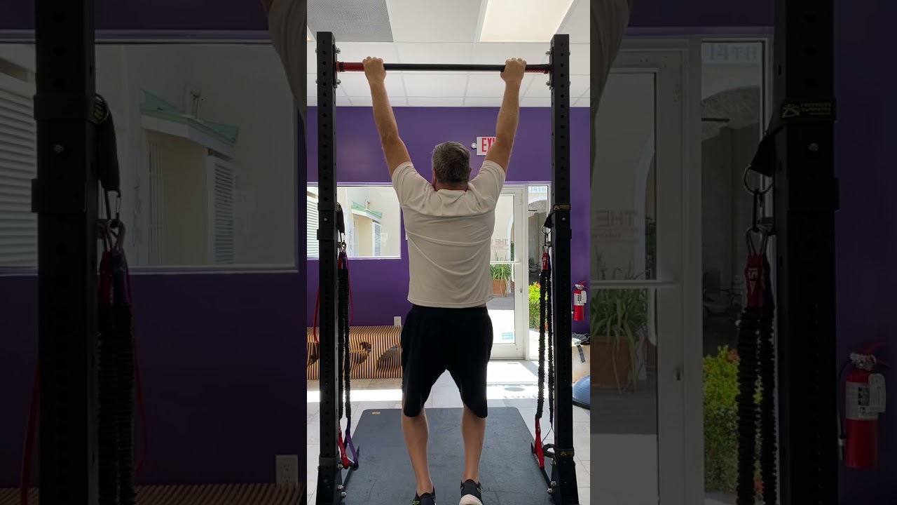 Hanging from a Pull-up Bar for Spine Decompression and Shoulder Health