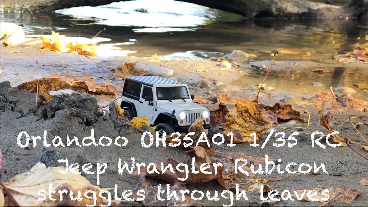 Orlandoo OH35A01 1/35 RC Jeep Wrangler Rubicon struggles through leaves