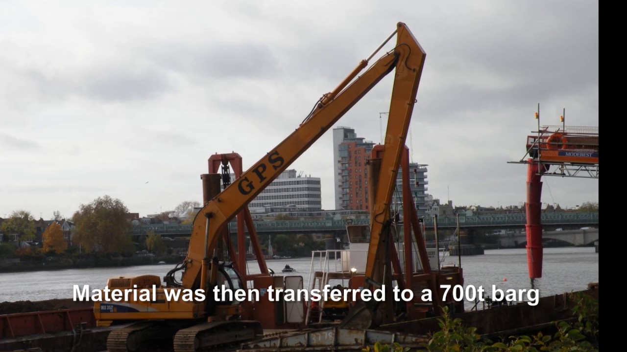 CONVEYOR OPERATIONS - LOADING MUCK AWAY ONTO RIVER THAMES BARGE
