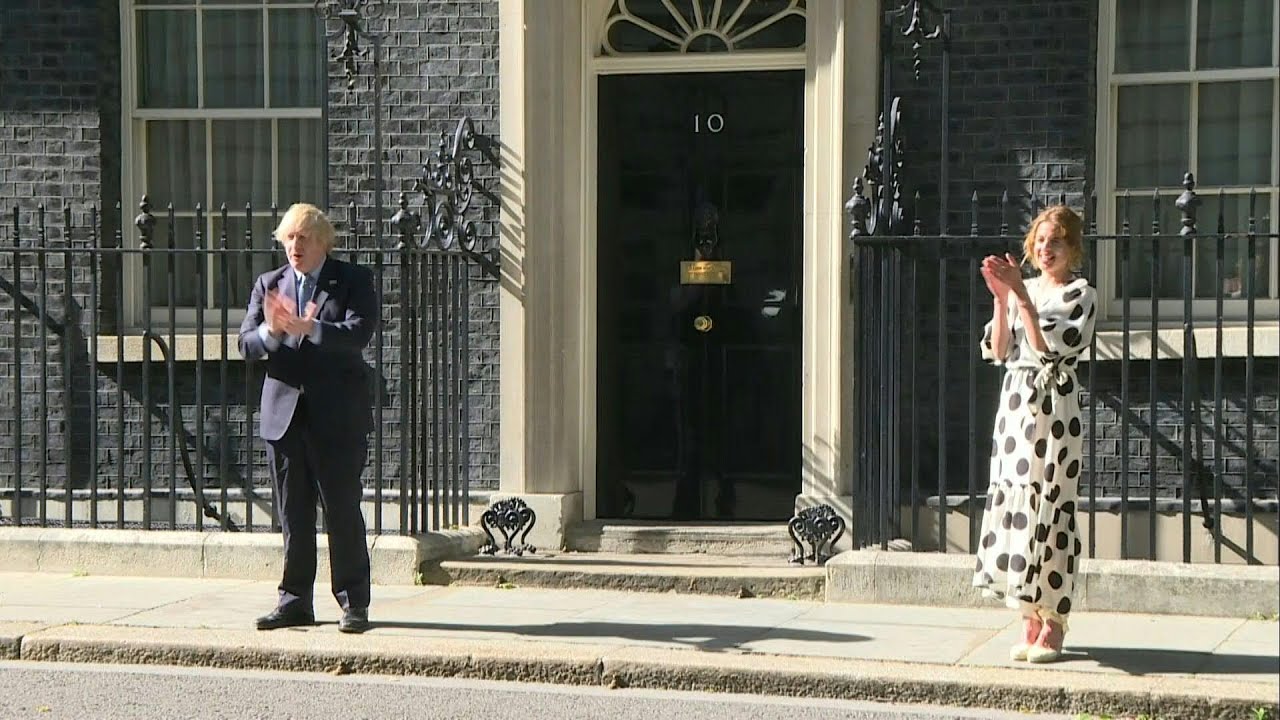 British prime minister and Clap for Carers founder clap for the NHS | AFP