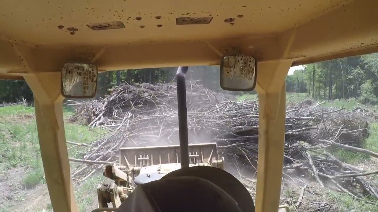 Vintage Caterpillar 951C on Clearing Job Root Raking