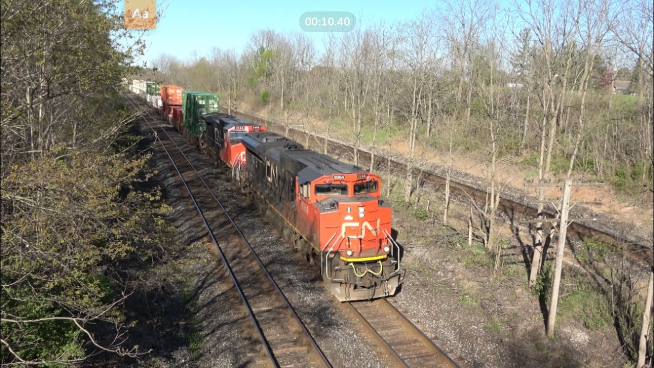 Fast intermodal / autorack train at Denfield Rd bridge. CN railway 8964 & 2569. 292 axles.