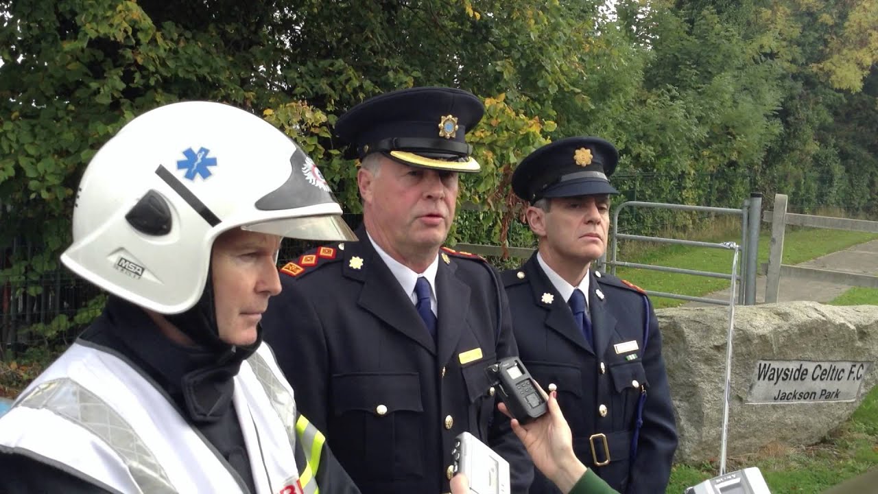 TheJournal.ie: Gardaí and fire officers at the scene of the Carrickmines tragedy