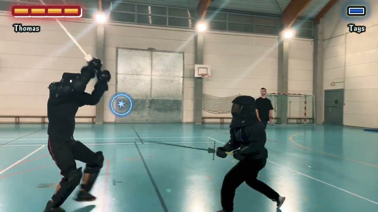 Sparring à l'épée longue Thomas et Tays.