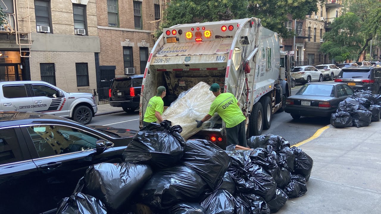 DSNY LR McNeilus Garbage Truck Crushing Huge Trash Bag Piles and Bulk