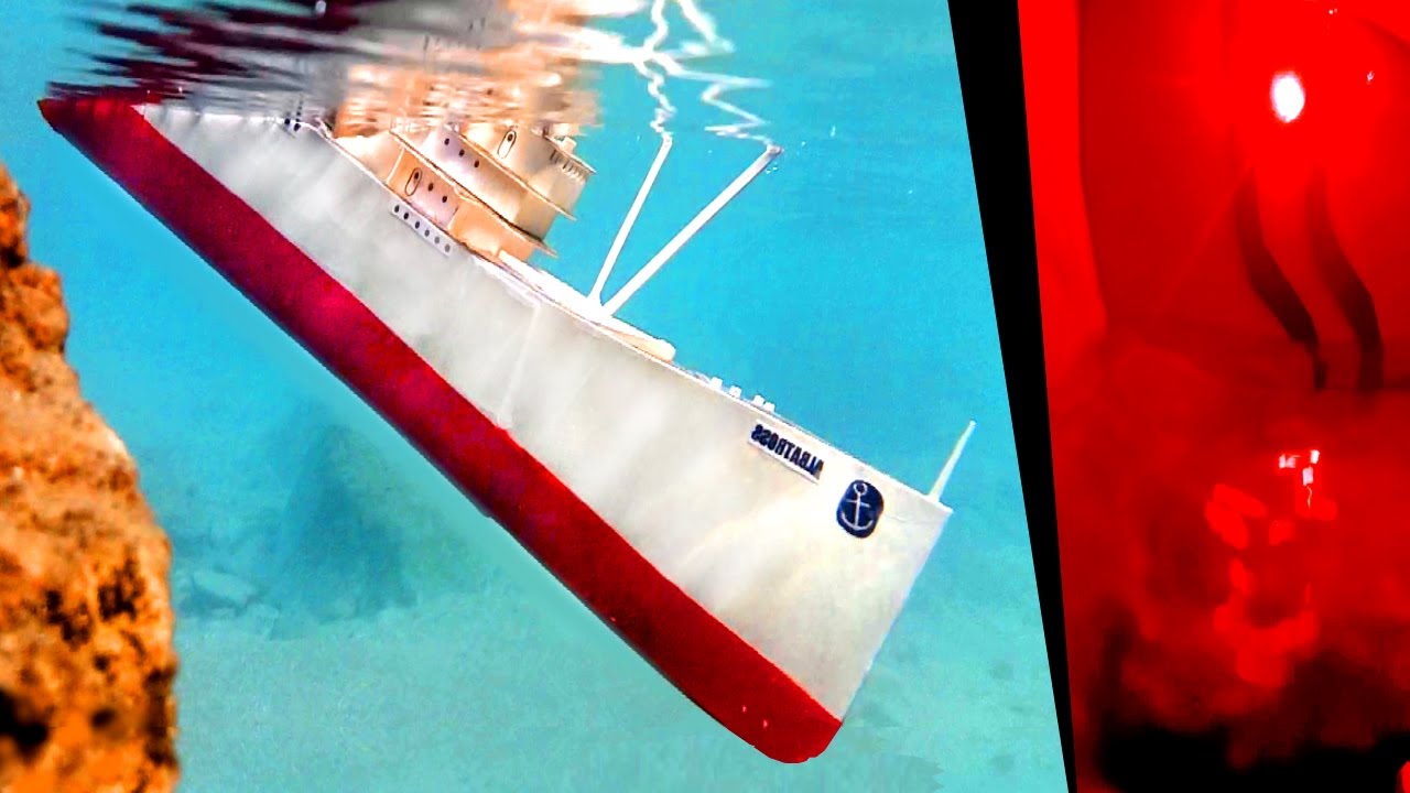 The cardboard ship is sinking, underwater shooting of the sinking of the RC homemade boat model