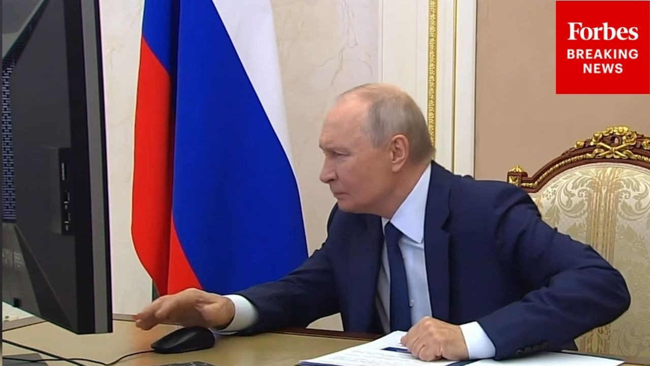 NEW: Footage Shows Russian President Putin Voting In Crucial Russian Parliamentary Elections