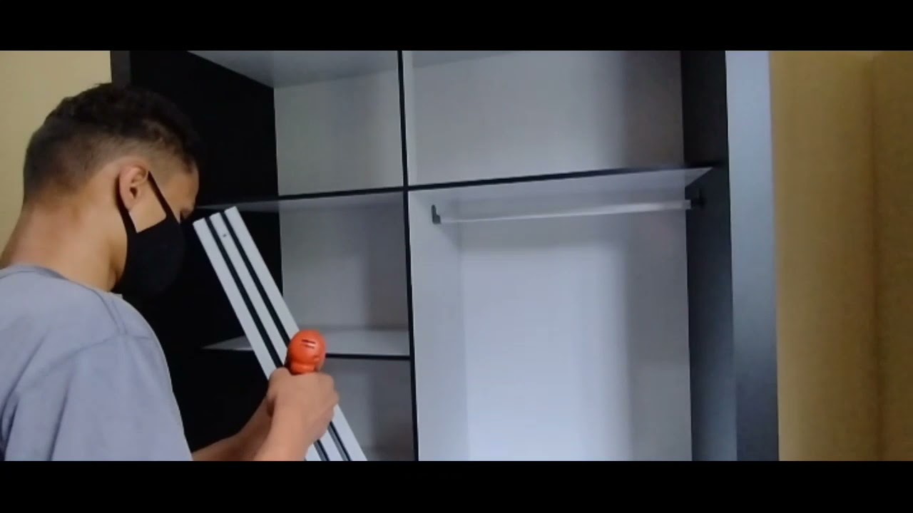 montagem de guardar-roupa 2portas de correr com espelho.